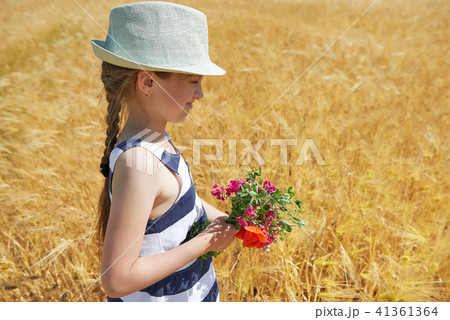 child girl walking in the yellow wheat field child girl walking in the yellow wheat field 41361364