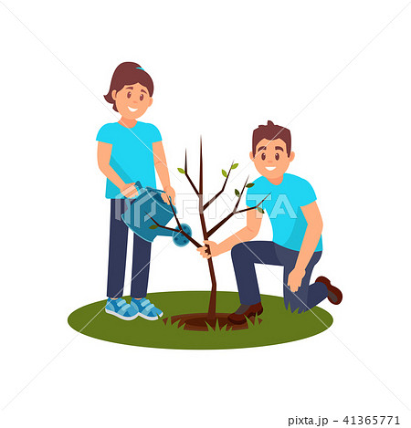 Two smiling volunteers planting tree. Man holding seedling, woman watering. People working in garden 41365771