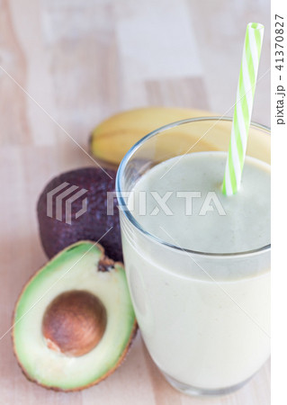 Smoothie with avocado, banana, milk and honey Smoothie with avocado, banana, milk and honey 41370827