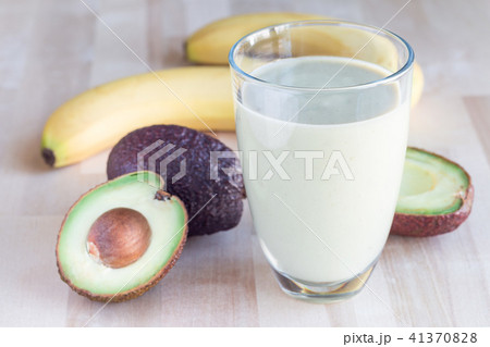 Smoothie with avocado, banana, milk and honey Smoothie with avocado, banana, milk and honey 41370828