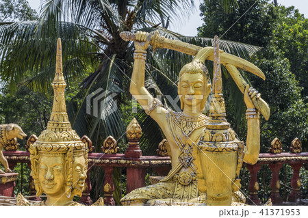 statue surrounds the temple of wat kraom. Cambodia 41371953