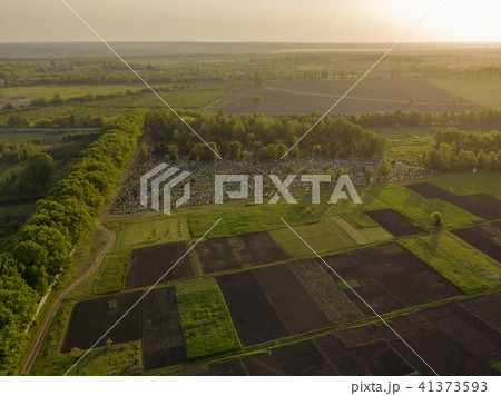 Aerial view from the drone, a bird's eye view of abstract geometric forms of agricultural fields Aerial view from the drone, a bird's eye view of abstract geometric forms of agricultural fields 41373593