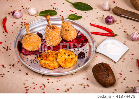 Breaded chicken legs 41374479