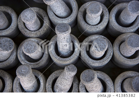 Black stone pestle and mortar, near Shore Temple 41385382