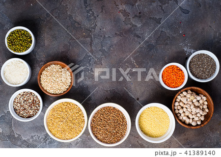 Superfoods and cereals selection in bowls on grey concrete background 41389140