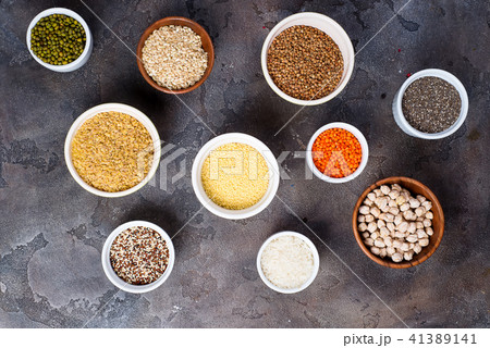 Superfoods and cereals selection in bowls on grey concrete background Superfoods and cereals selection in bowls on grey concrete background 41389141