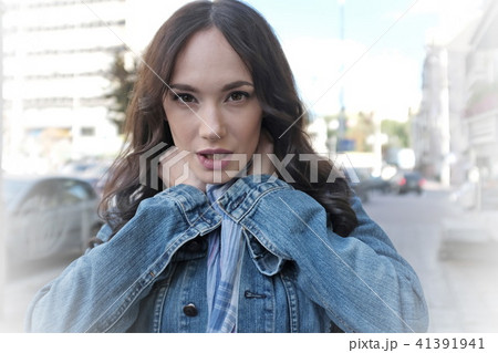 Beautiful young woman is walking 41391941