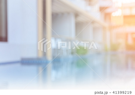 Blurry outdoor swimming pool background Blurry outdoor swimming pool background 41399219