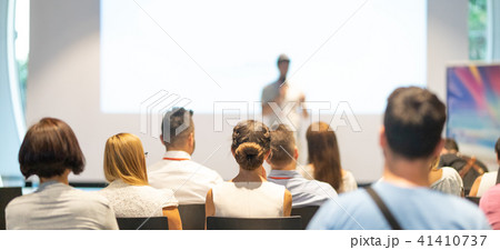 Business speaker giving a talk at business conference event. Business speaker giving a talk at business conference event. 41410737