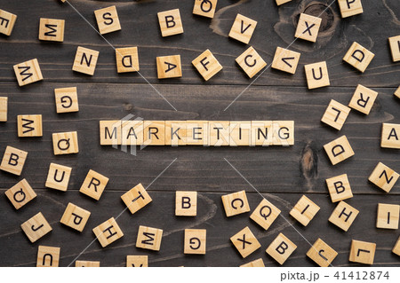 Marketing word wood block on table for business 41412874