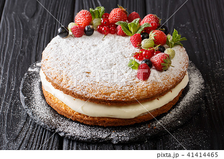 Freshly baked holiday Victoria sandwich cake 41414465