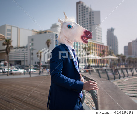 Unusual manager in funny mask Unusual manager in funny mask 41419692