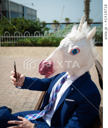 Unicorn makes a photo by phone Unicorn makes a photo by phone 41419718