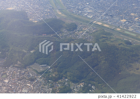 Aerial view of plane window looking down japan Aerial view of plane window looking down japan 41422922