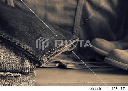 Black jeans on wooden. Black jeans on wooden. 41423157