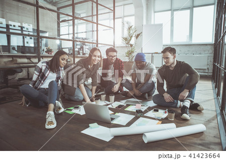 Pleasant optimistic people are working together 41423664