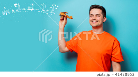 man with wooden airplane and dreaming travel route 41428952