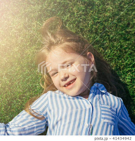 Portrait of pretty little smiling girl. 41434942