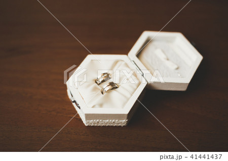 Two golden wedding rings isolated background concept Two golden wedding rings isolated background concept 41441437