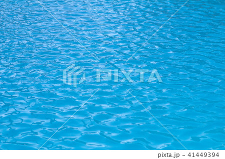 small waves and ripples on the blue water 41449394