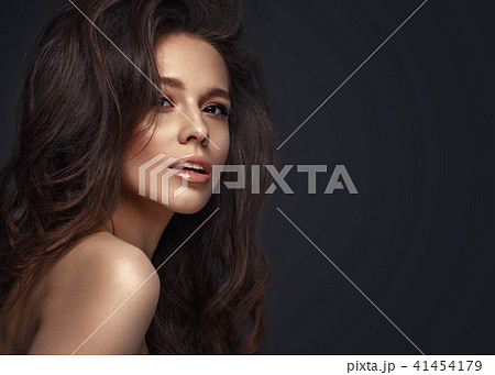 Beautiful brunette model : volume curls, classic makeup and sexy lips. The beauty face. Beautiful brunette model : volume curls, classic makeup and sexy lips. The beauty face. 41454179