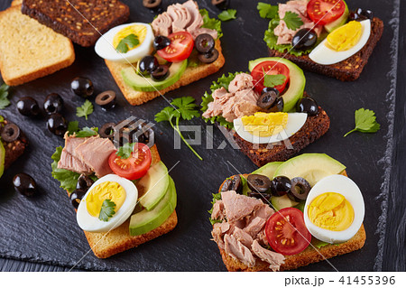 tuna sandwiches on a black board tuna sandwiches on a black board 41455396