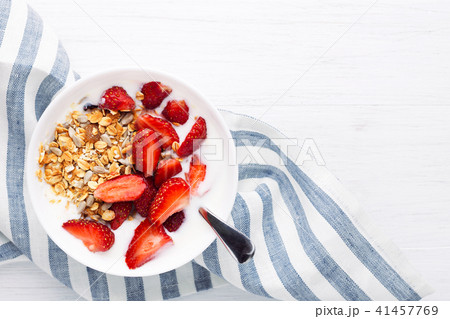 Healthy breakfast with granola and strawberry. 41457769