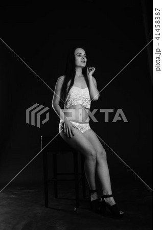 Young beautiful woman in a fashionable linen luxury brunette in the Studio. 41458387