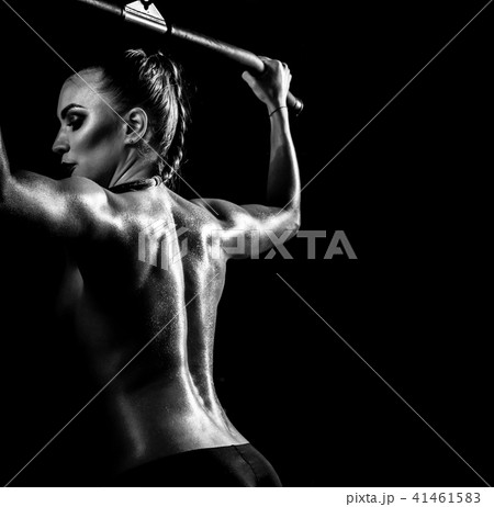 fitness woman execute exercise on black background fitness woman execute exercise on black background 41461583