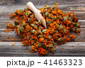 Dried calendula flowers on wooden Medicinal plants 41463323