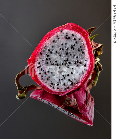 Exotic fruit Pitahaya isolated on a black glossy background Exotic fruit Pitahaya isolated on a black glossy background 41463424