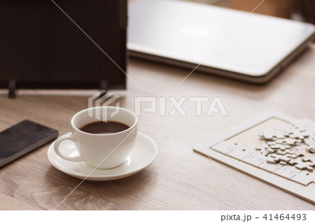 Coffee cup on wooden table with tablet laptop Coffee cup on wooden table with tablet laptop 41464493