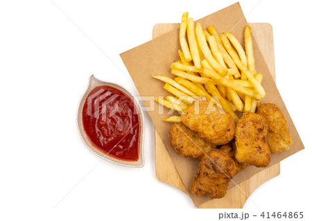 French fries with nuggets and ketchup 41464865