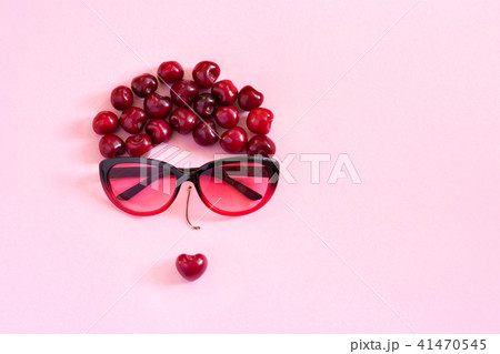 abstract young woman sweet cherry glasses Concep 41470545