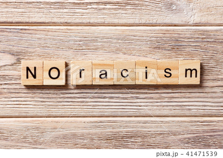 No racism word written on wood block.  41471539