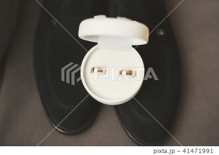 Two golden wedding rings isolated background concept Two golden wedding rings isolated background concept 41471991