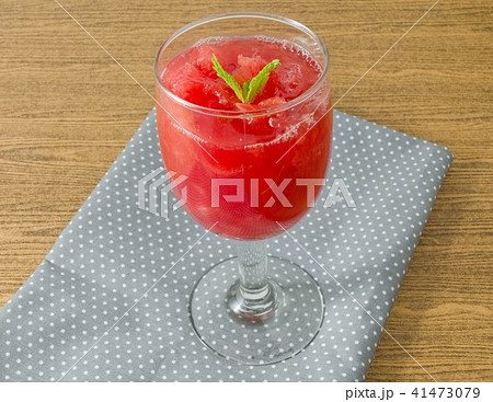 Ripe and Sweet Watermelon Juice with Mint Leaves Ripe and Sweet Watermelon Juice with Mint Leaves 41473079