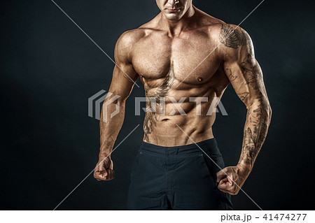 Unrecognizable Strong bodybuilder man with perfect abs, shoulders,biceps, triceps, chest 41474277