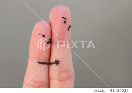 Finger art of couple. Woman kisses man   41486038