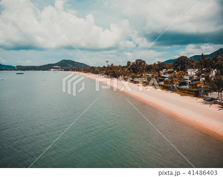 Aerial view of beautiful tropical beach and sea with palm and other tree in koh samui island 41486403