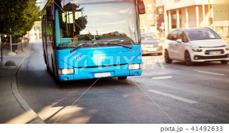 Bus moving on the road in city in early morning 41492633