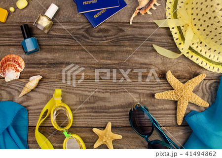 Summer accessories on wooden old background. Summer accessories on wooden old background. 41494862