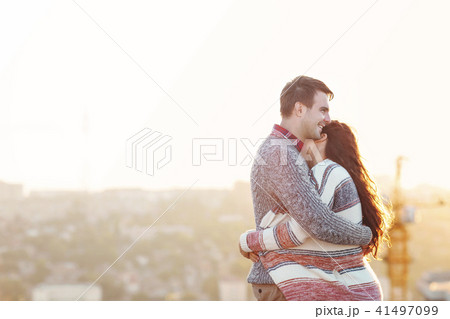 Young man and woman in love having fun outdoors 41497099