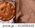 Apricot cake baked in foil on a wooden table 41498448