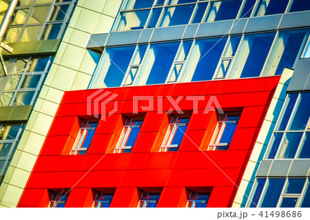 Part of the facade modern building with red and blue Part of the facade modern building with red and blue 41498686