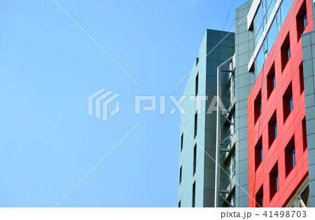 part of the red blue facade urban buildings and sky 41498703