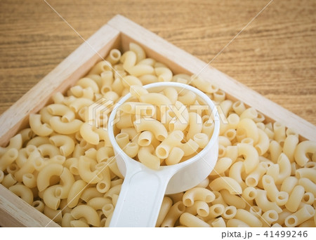 Elbow Macaroni or Gomiti Pasta in Measuring Cup Elbow Macaroni or Gomiti Pasta in Measuring Cup 41499246