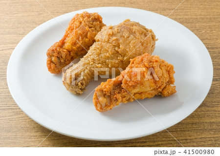 Fried Chicken Wings on A White Dish 41500980