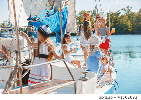 The children on board of sea yacht The children on board of sea yacht 41502033
