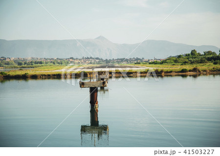 the plane is landing to the airport of Corfu at summer day the plane is landing to the airport of Corfu at summer day 41503227